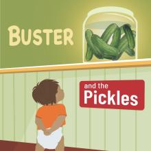A toddler looks up at a large jar of pickles on a countertop.