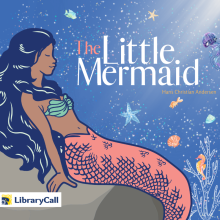 Mermaid with pink tail, long black hair, and brown skin leans on a rock under the ocean